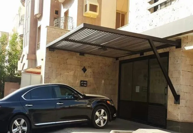 تنسيق حديقة سطح بجلسة برجولة