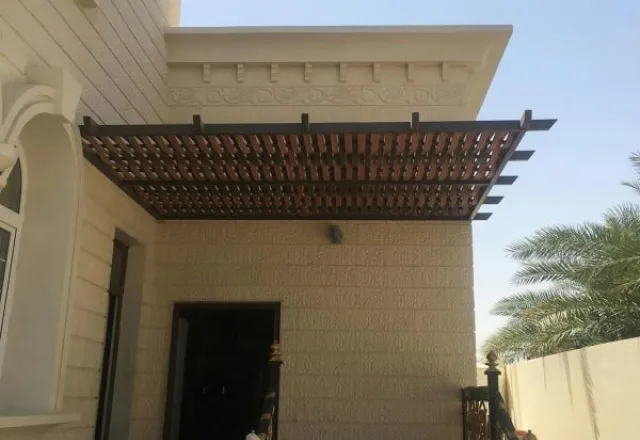 تنسيق حديقة سطح بجلسة برجولة